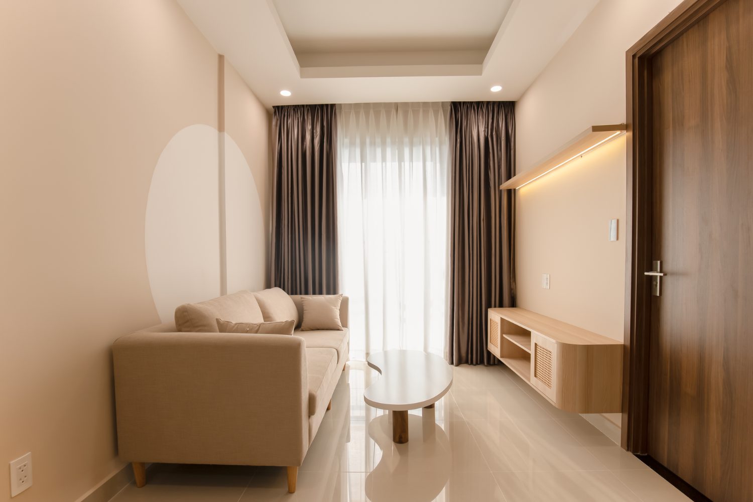 Considered interior with warm neutral furnishings
